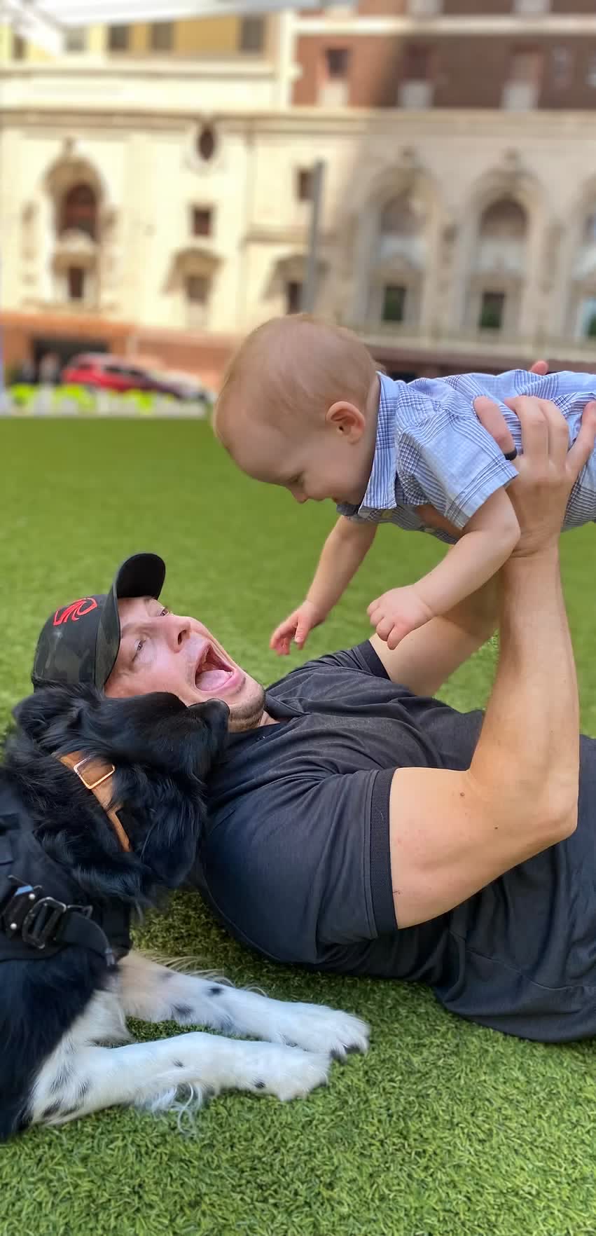 Zack Starr off duty, playing with his son and his dog